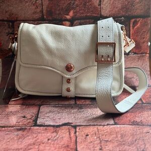 NWT Aimee Kestenberg White Leather Crossbody Bag with pockets and wide strap.